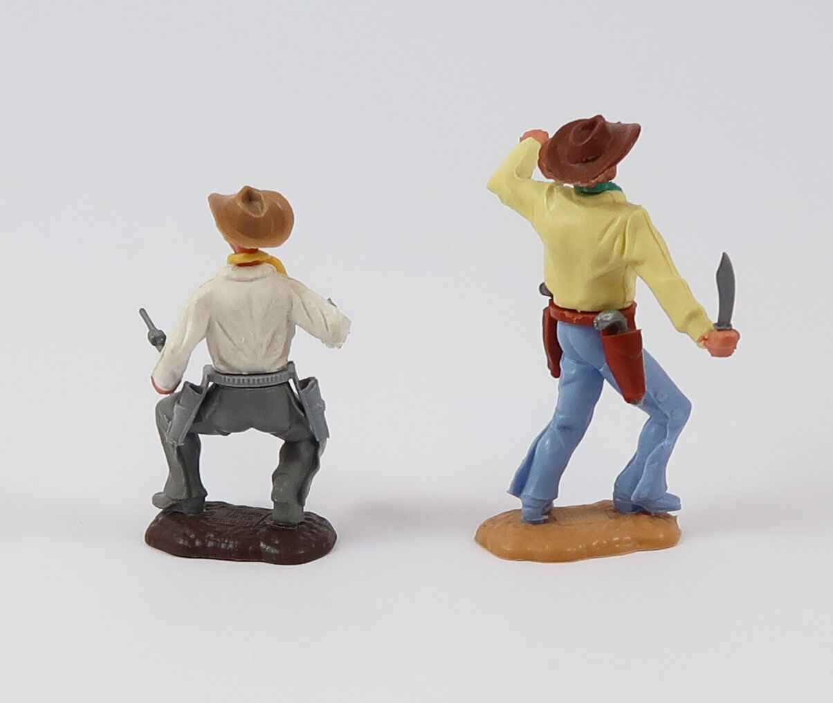 Timpo 2 Cowboys mit Pistolen und Messer