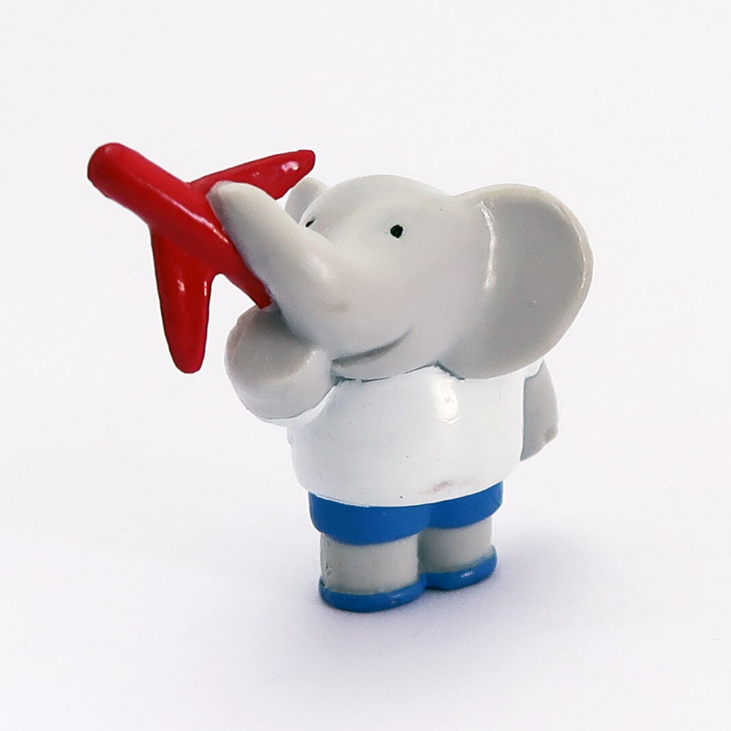 babar_alexander_mit_flugzeug_front Babar Alexander PVC Figur