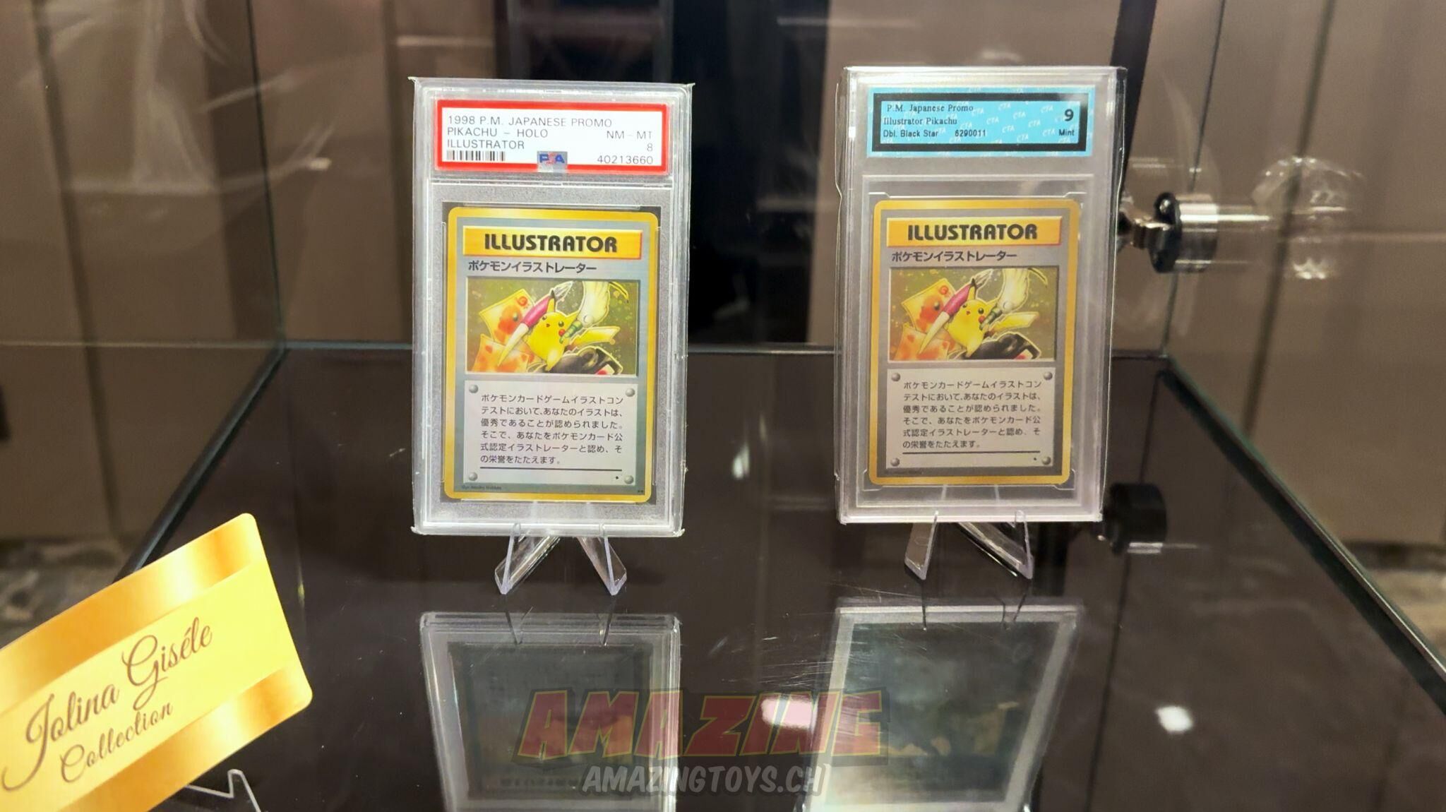 Deux cartes Pikachu Illustrator en slab PSA et CGC dans la vitrine chez AMAZINGTOYS®